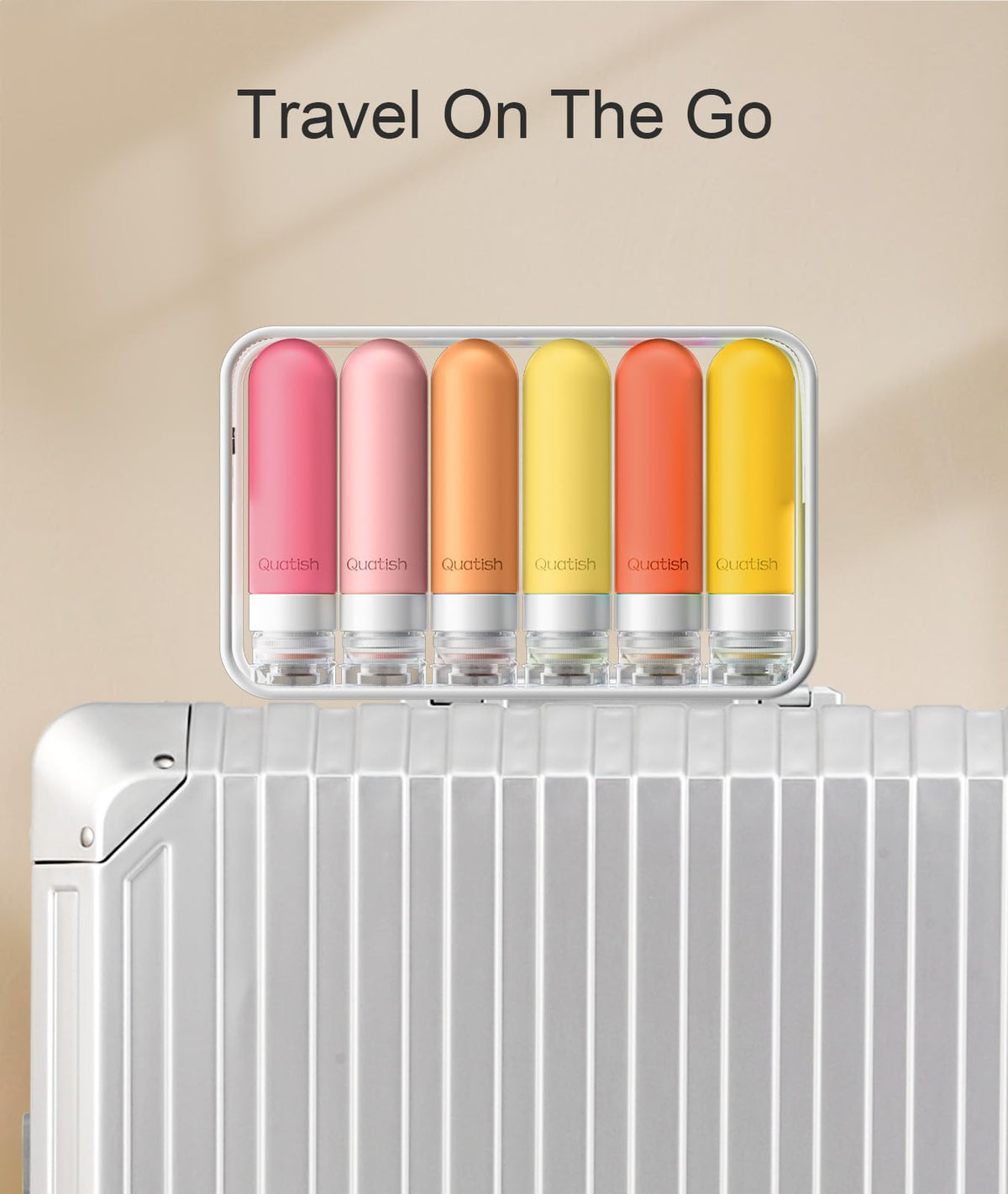Quatish Travel Bottles in a suitcase ready for travel