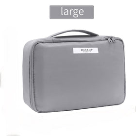 Queboom Travel Makeup Bag grey packed for travel