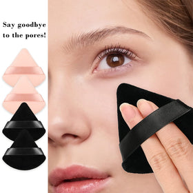 RAREIUS Triangular Powder Puff Sponges displayed on a vanity