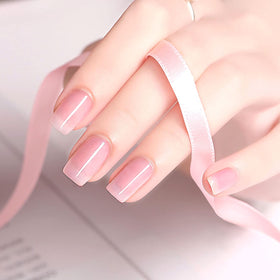 RARJSM Pink Gel Nail Polish curing under UV lamp