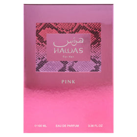 RASASI Hawas Pink Eau de Parfum on vanity with flowers