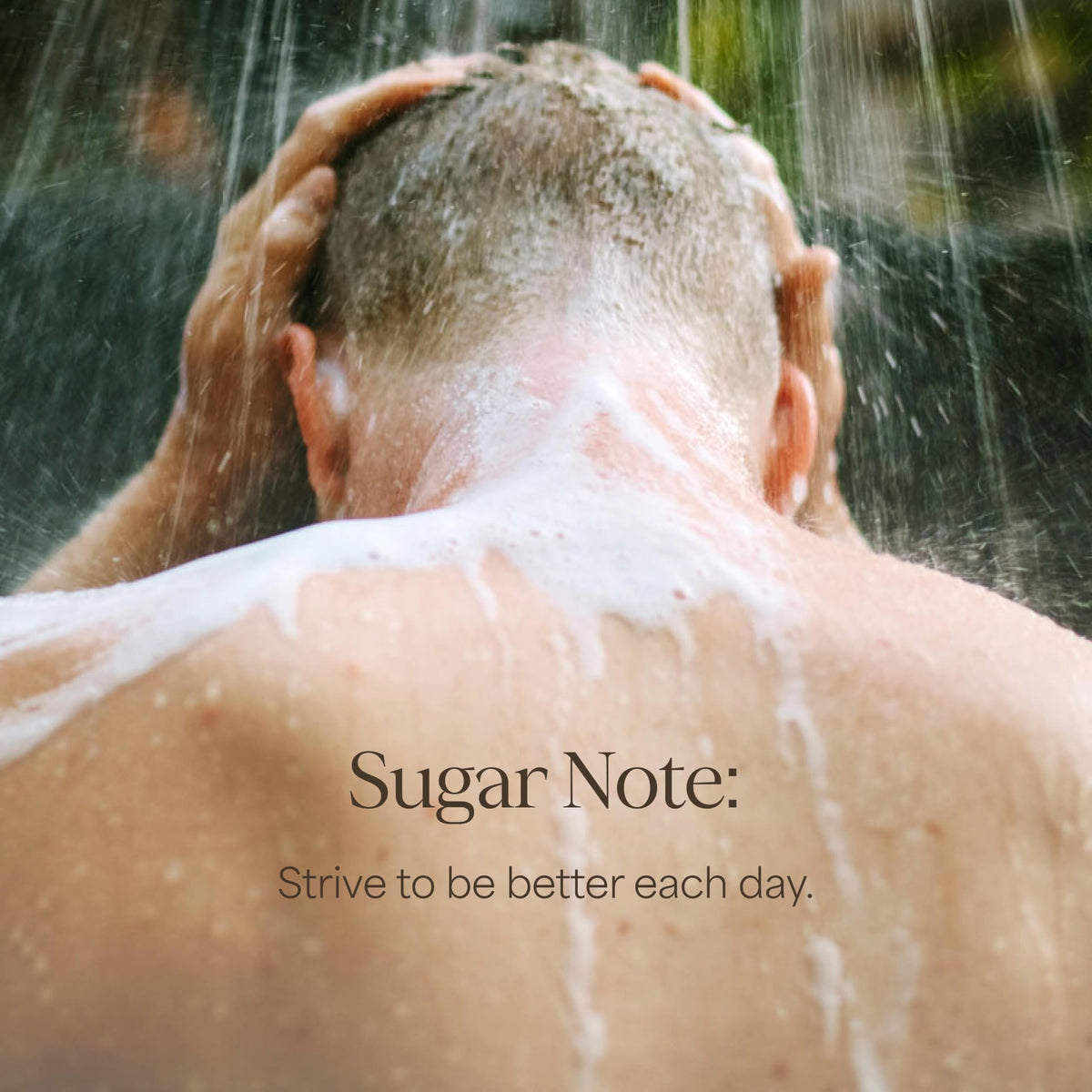 RAW SUGAR Charcoal Bamboo Reset Body Wash cap open showing texture