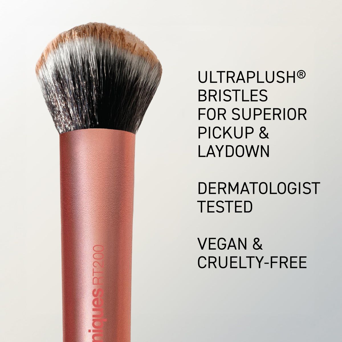 Real Techniques Expert Face Brush used on a model's face for foundation application