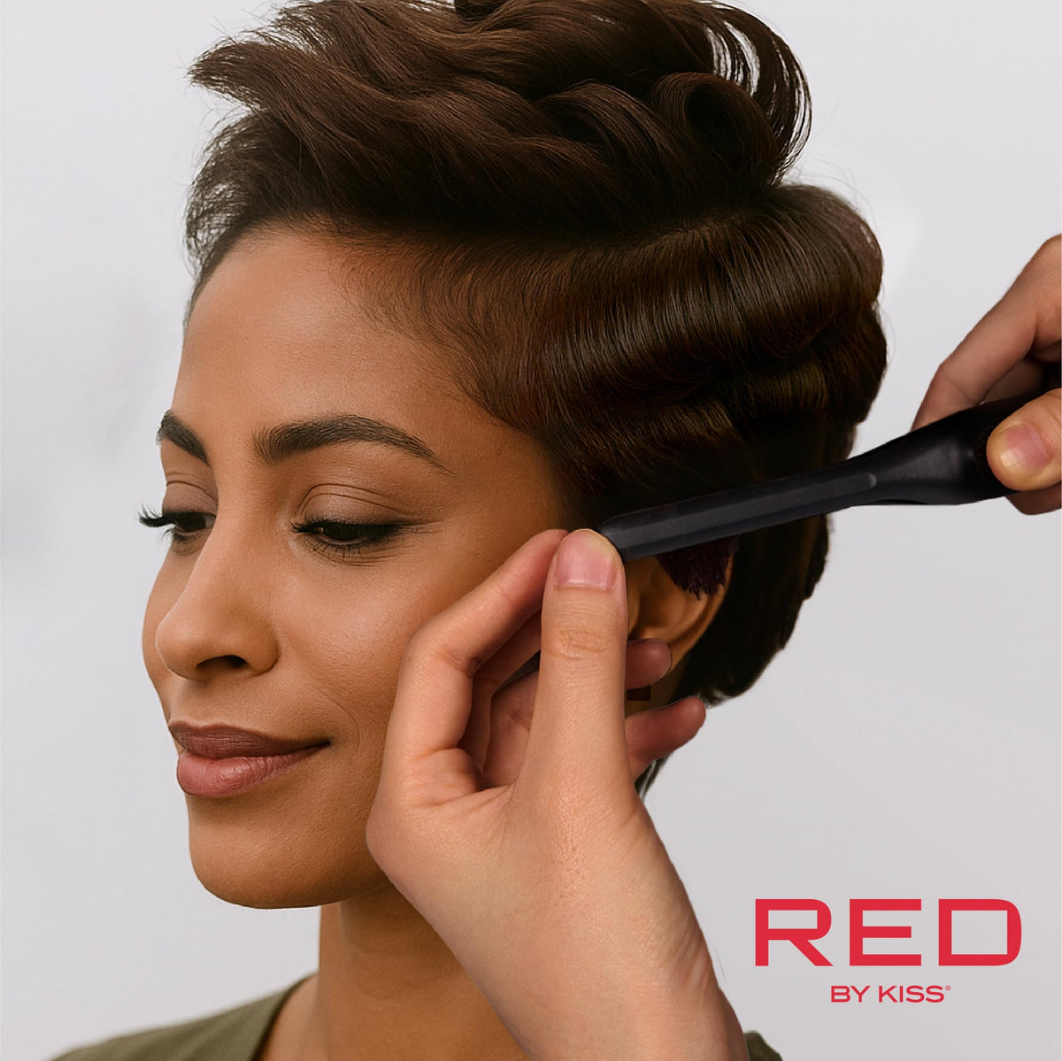 Red by Kiss Flat Iron demonstrating styling short hair