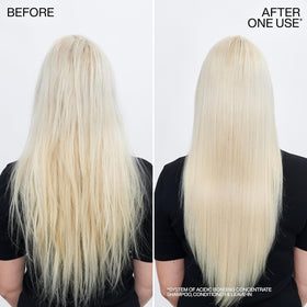 Redken Acidic Bonding Concentrate Shampoo in a bathroom setting