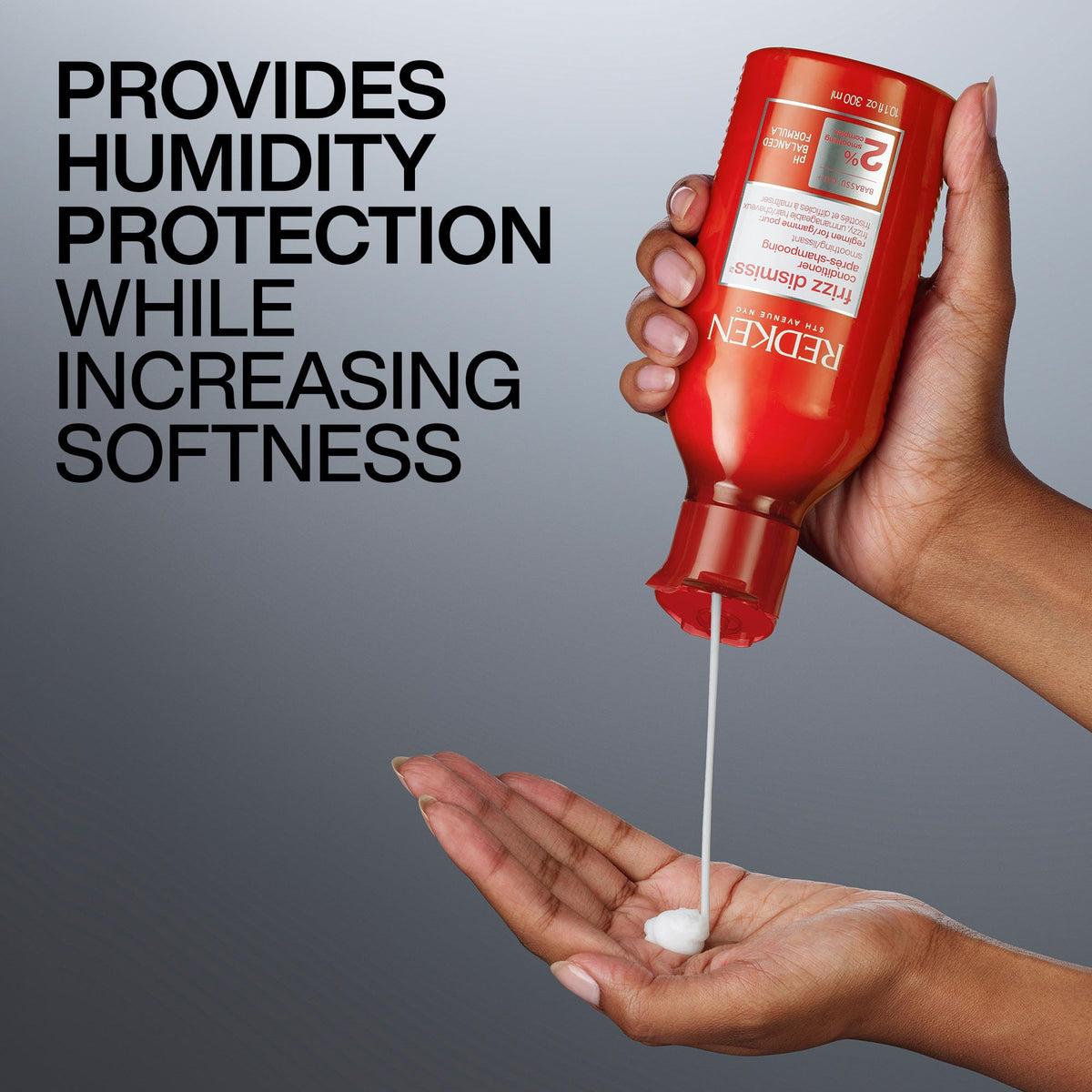 Redken Frizz Dismiss Conditioner in bathroom setting