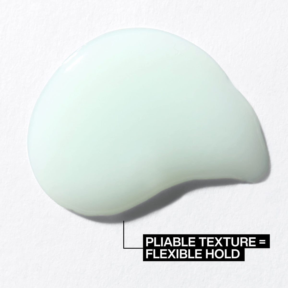 Redken Pliable Styling Paste 200g applied to hair