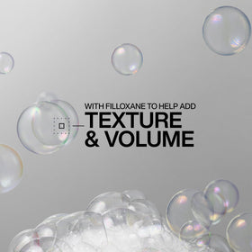 Redken Volume Injection Shampoo in bathroom setting