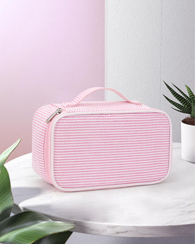 Relavel Pink Makeup Bag with skincare products inside
