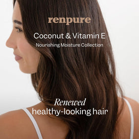RENPURE Coconut & Vitamin E Nourishing Shampoo in a shower setting