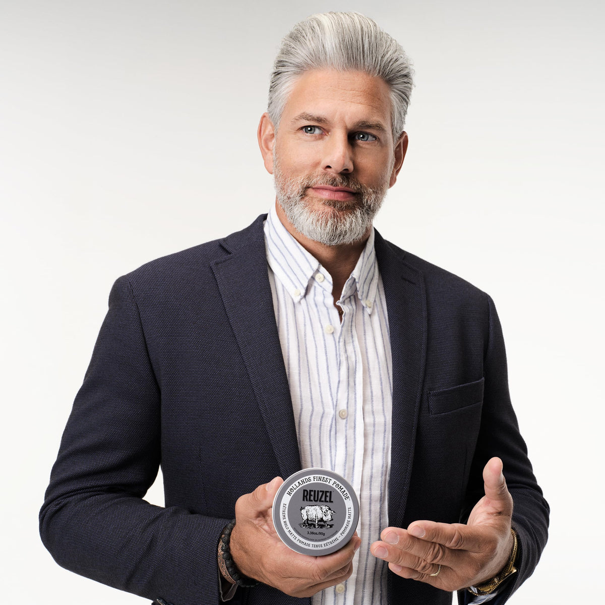 REUZEL Extreme Hold Matte Pomade with styling tools