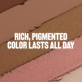 REVLON Glimmer Shadow Multi-Stick Tini Time highlighter on cheekbones