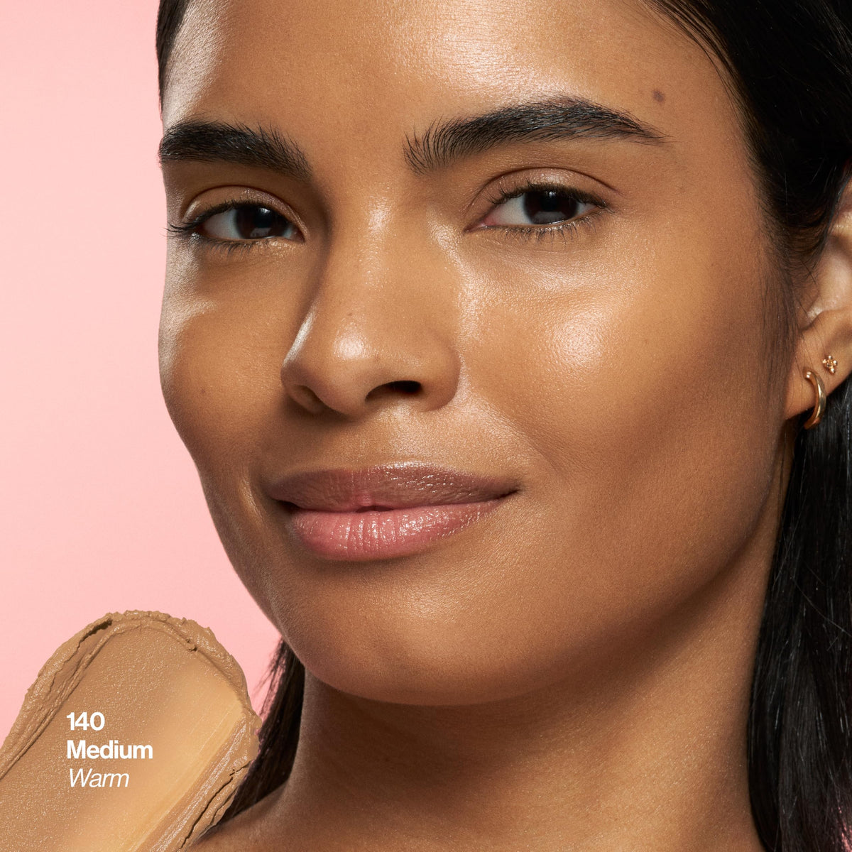 REVLON Glimmer Tinted Moisturizer Stick 140 Medium swatch on skin