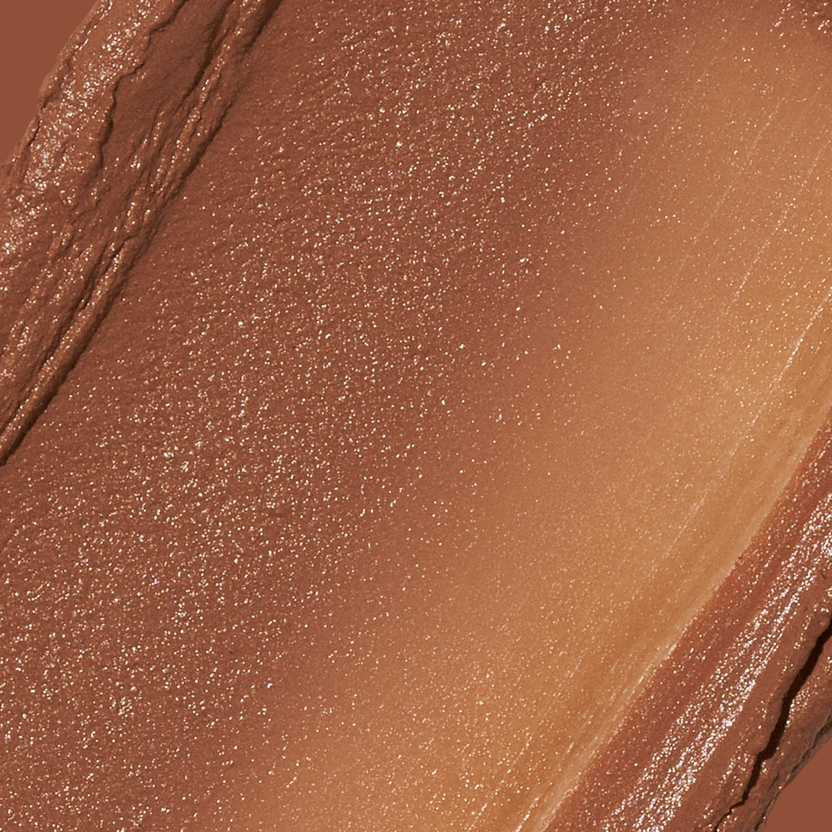 REVLON Glimmer Tinted Moisturizer Stick 170 Deep swatch on skin