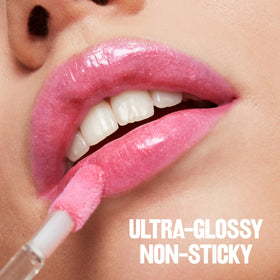 REVLON Super Lustrous Lip Gloss Black Cherry on a makeup table