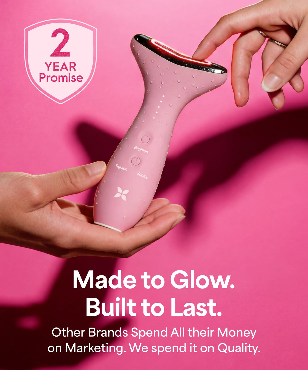 REVOMADIC Genie Facial Massager displaying blue light mode