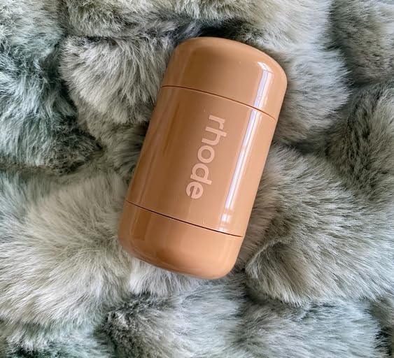 Rhode Pocket Blush Date Cake showing creamy texture on the skin