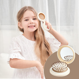 RHOS Compact Foldable Hair Brush in use with mirror reflection