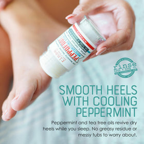 Rinse Bath & Body Peppofoot Heel Balm Stick packaging on a wooden surface