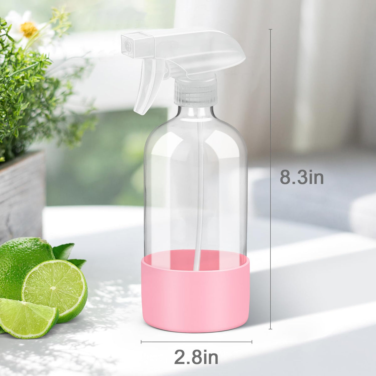 Rionisor glass spray bottle on a kitchen counter with cleaning supplies