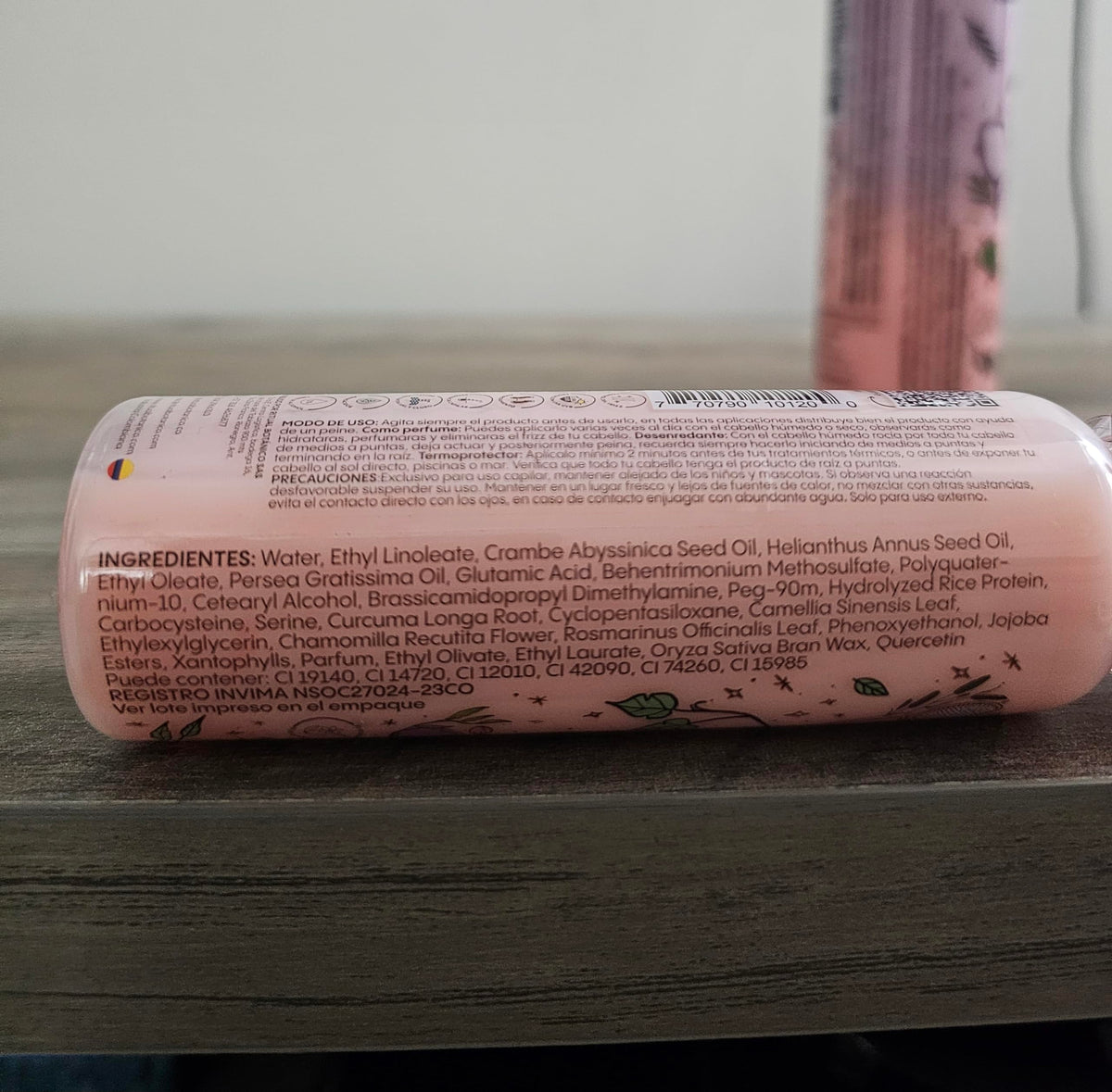 Ritual Botanico Hair Thermoprotector 120ML pink bottle on a bathroom counter