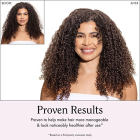 Rizos Curls Travel Refresh & Detangle Spray in a bathroom setting