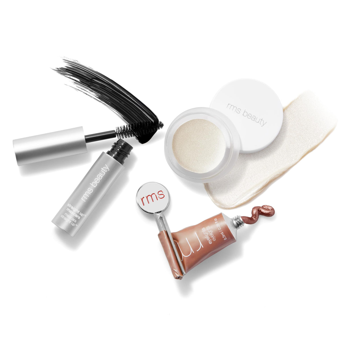 RMS Beauty Luminizer cream highlighter with makeup brushes