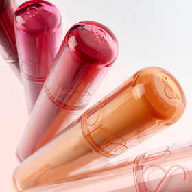 rom&nd The Juicy Lasting Tint 10 Bare Apricot in hand