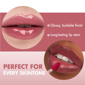 rom&nd The Juicy Lasting Tint Fig Fig Rosy Plum on model's lips