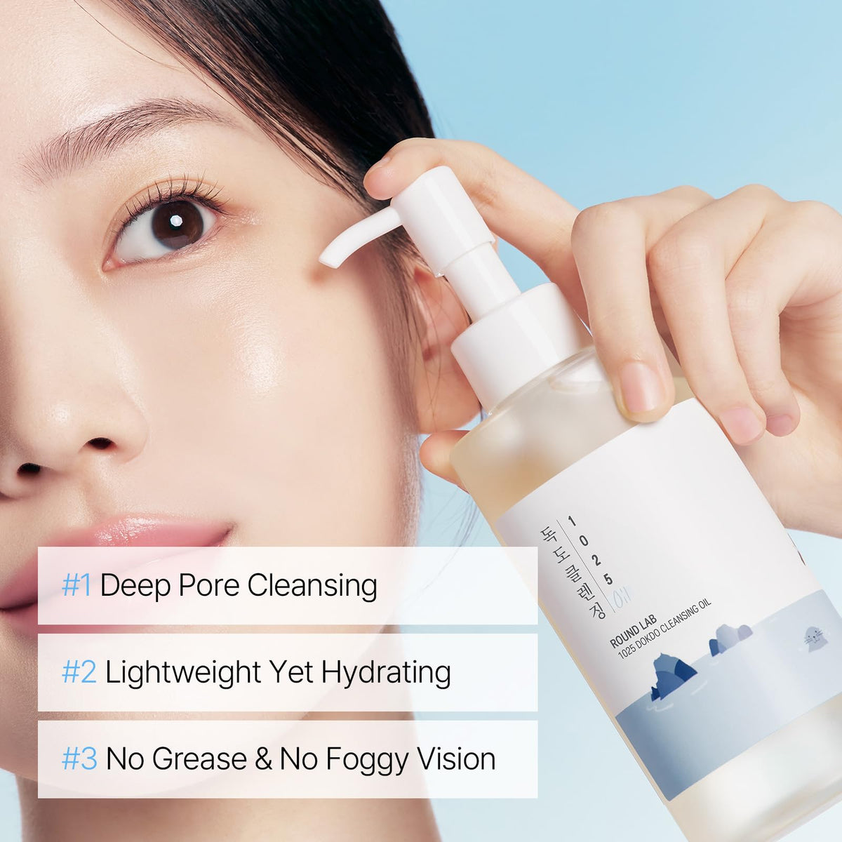 ROUND LAB 1025 Dokdo Cleansing Oil in use on a model's face