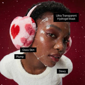 ROUND LAB Camellia Deep Collagen Firming Face Mask set displayed with flowers