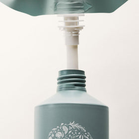 RŌZ Foundation Conditioner Refill in a bathroom setting