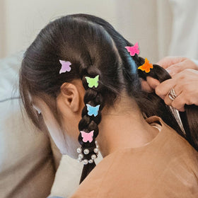 Ruocce butterfly hair clips arranged by colour