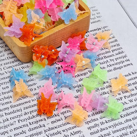 Ruocce butterfly hair clips in use with long hair