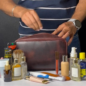 RUSTIC TOWN Leather Toiletry Bag packed for travel with handle