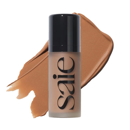 Saie Dew Bronze Liquid Bronzer Stick in Sand, front view
