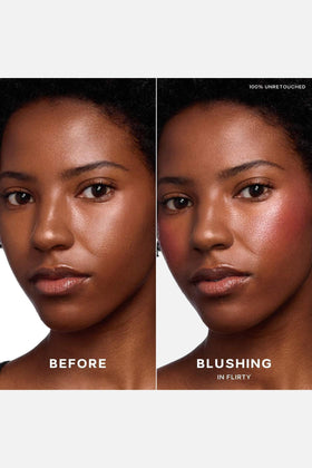 Saie Dew Liquid Blush Flirty applied to cheeks