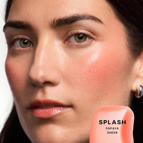 Saie Glossybounce Hydrating Lip Gloss in Splash shade on lips