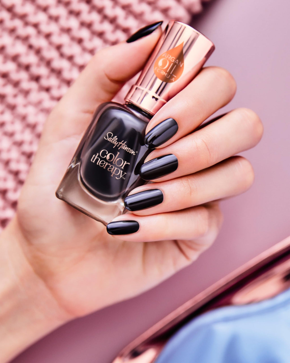 Sally Hansen High Gloss Top Coat with shiny finish on nails
