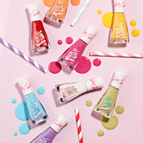 Sally Hansen Insta-Dri Hatcha Matcha nail polish on a vanity table