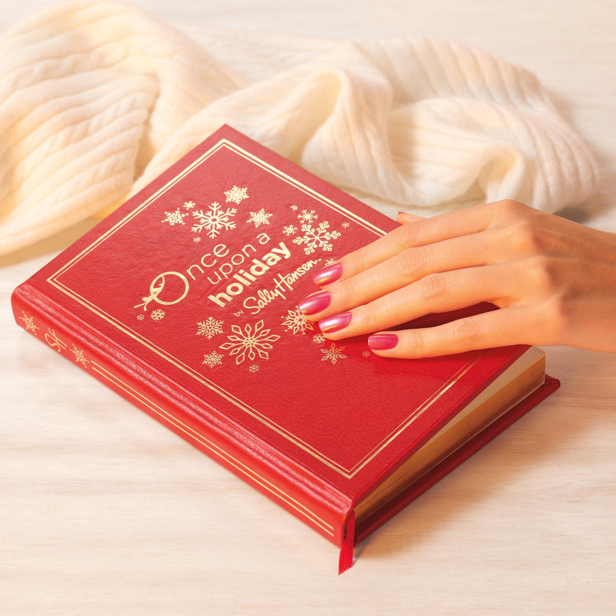 Sally Hansen Miracle Gel Holiday Romance on a festive background