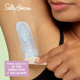 Sally Hansen wax kit showing 20 cloth strips and wooden spatulas