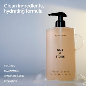 Salt & Stone Body Wash Saffron & Cedar bottle with lather