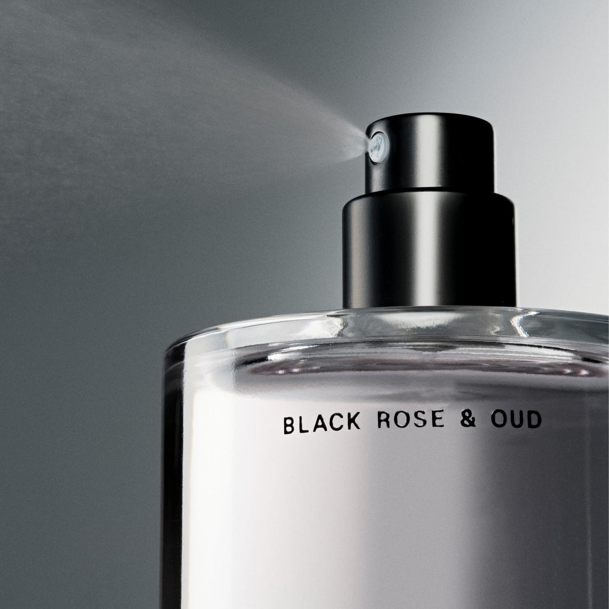 Salt & Stone Hair & Body Mist Black Rose & Oud with floral background
