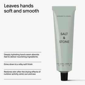 Salt & Stone Hand Cream 2 fl oz on a wooden table with plants