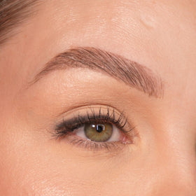 Sandstone Scandinavia Eyeliner Pencil next to other makeup products
