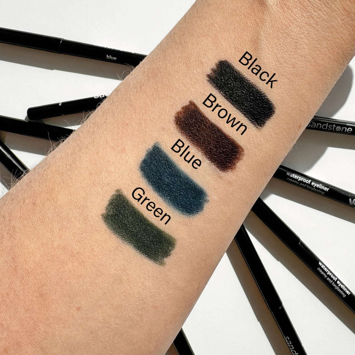 Sandstone Scandinavia Waterproof Eyeliner Pencil with swatch on skin