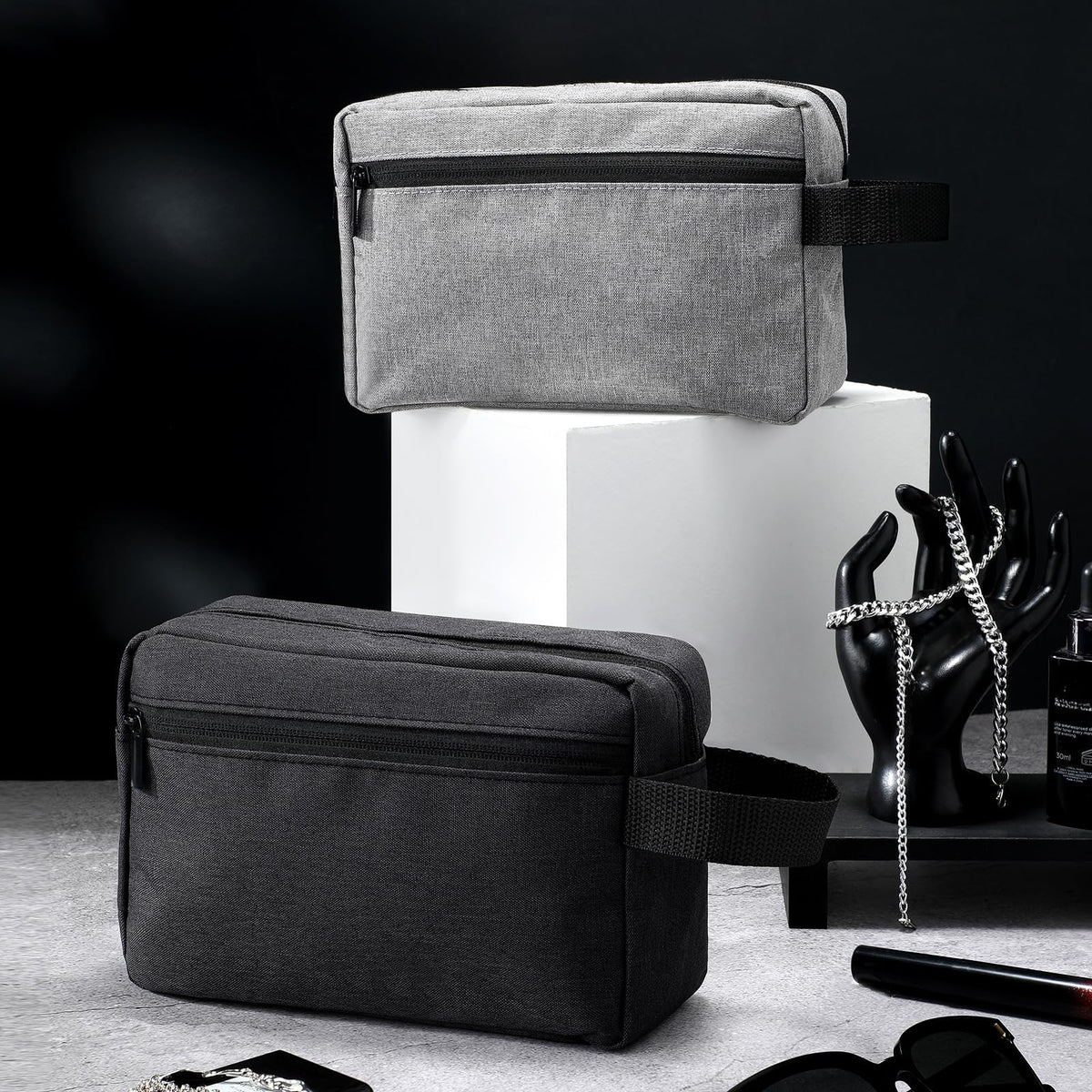Sanwuta toiletry bag in dark grey with toiletries inside