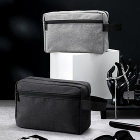 Sanwuta toiletry bag in dark grey with toiletries inside