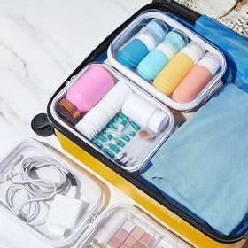 Sanwuta zipper cases displayed on a travel bag